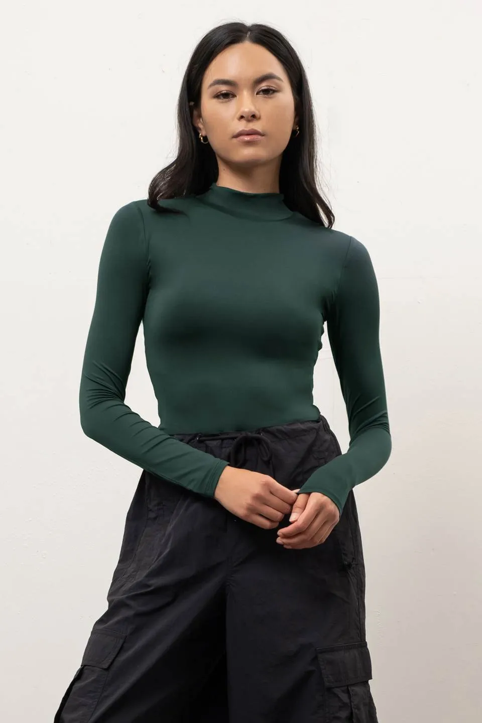 SEAMLESS MOCK NECK LONG SLEEVE BODYSUIT